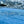 AEROSTUFFY Box L blau schwimmend im Wasser Close-up